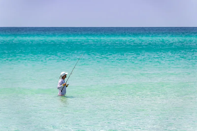 Surf fishing in the emerald waters of the Gulf