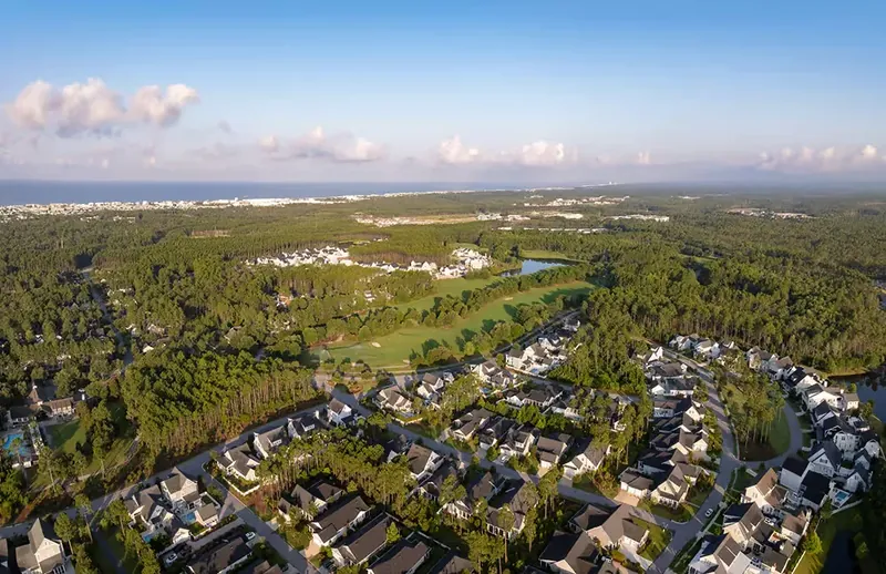 The community and its golf course, the Gulf beyond